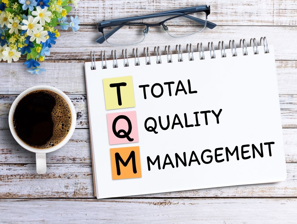 Total Quality Management (TQM) fosters a culture of continuous improvement through customer-centricity and systematic quality enhancement methods.